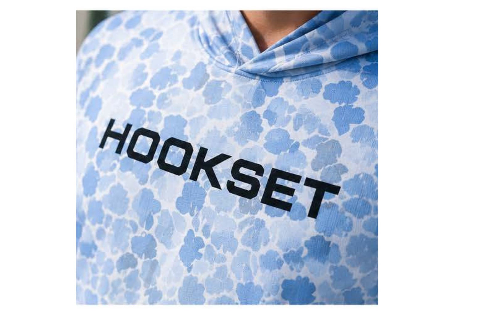 Closeup of Hookset Blue Ice UPF 50 fishing hoodie logo